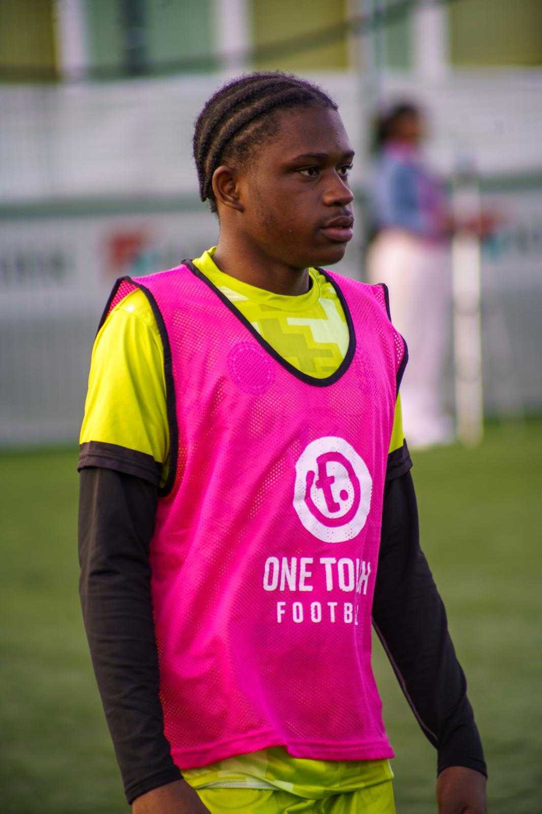 Player wearing a One Touch Football training bib