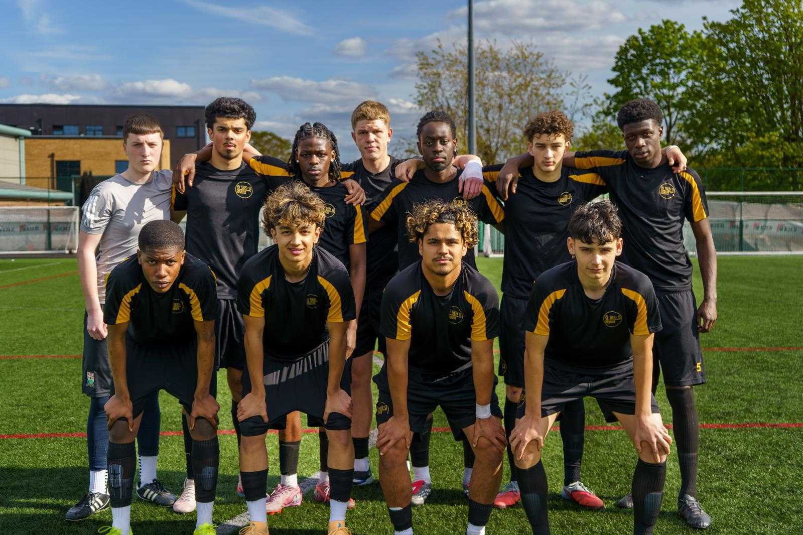 Full grassroots squad lined up for a team photo